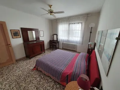Letto o letti in una camera di Casa delle Conchiglie