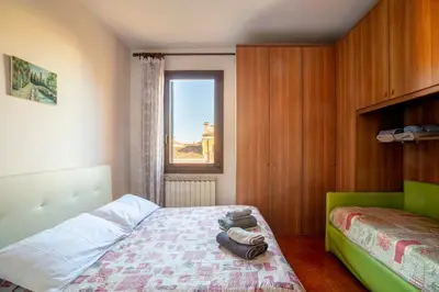 Letto o letti in una camera di Residenza Sabrina