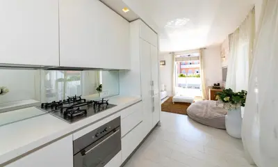 Cucina o angolo cottura di Dominique - Carraro Immobiliare - Family Apartments
