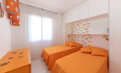Letto o letti in una camera di Dominique - Carraro Immobiliare - Family Apartments