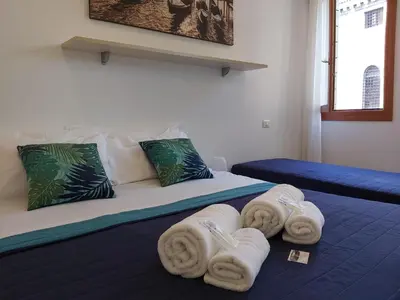 Letto o letti in una camera di Veneziacentopercento Corderie Apartment