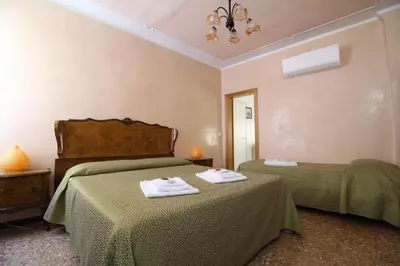 Letto o letti in una camera di Veneziacentopercento Arsenale Apartment