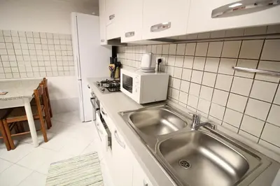 Cucina o angolo cottura di Veneziacentopercento Picenin Apartment