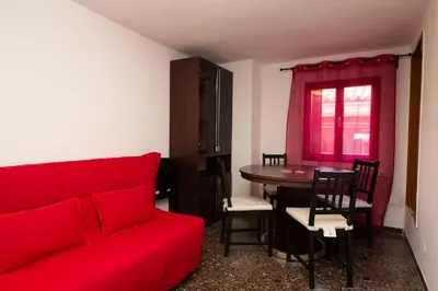 Area soggiorno di Veneziacentopercento Ole Apartment