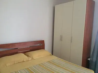 Letto o letti in una camera di Villa Pinna