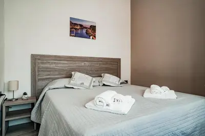 Letto o letti in una camera di Angelica Home