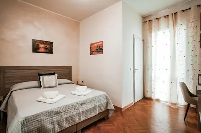 Letto o letti in una camera di Angelica Home