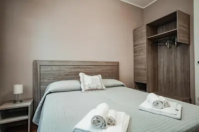 Letto o letti in una camera di Angelica Home