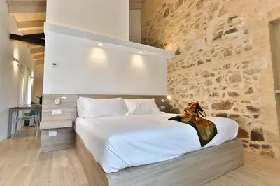 Letto o letti in una camera di Casa Massaro Todeschini