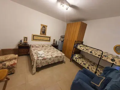 Letto o letti in una camera di Residenza oleandro rosa