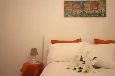 Letto o letti in una camera di Ca' Fiordaliso