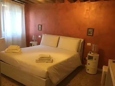 Letto o letti in una camera di Fondaco di Rialto