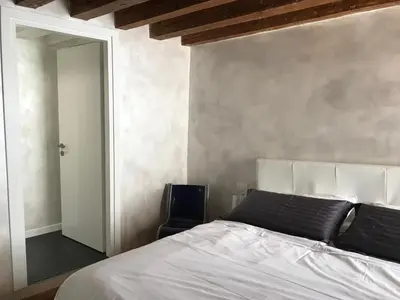 Letto o letti in una camera di Fondaco di Rialto