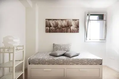 Letto o letti in una camera di Al Battello Apartments