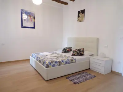 Letto o letti in una camera di Casa Venier