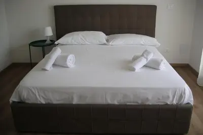Letto o letti in una camera di Tourism E Business Superior Rooms