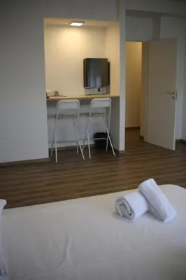 Letto o letti in una camera di Tourism E Business Superior Rooms