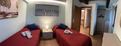 Letto o letti in una camera di MORI 1 CON BELLA VISTA NUOVO APPARTAMENTO