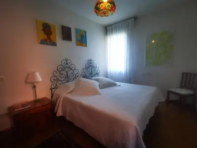 Letto o letti in una camera di Villa Liberty