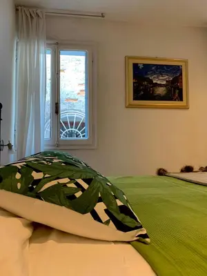Letto o letti in una camera di REGINA - ROMANTIC STUDIO near RIALTO