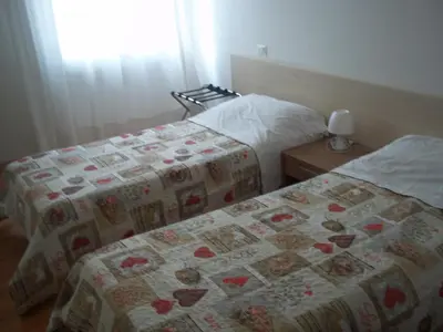 Letto o letti in una camera di Hotel Gronda Lagunare