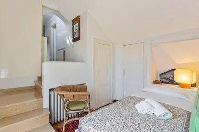 Letto o letti in una camera di ֍ Splendido Attico - Arsenale - con Terrazza ֍
