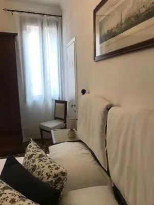 Letto o letti in una camera di B&B Al Teatro with canal view