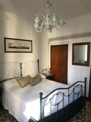 Letto o letti in una camera di B&B Al Teatro with canal view
