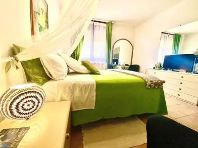 Letto o letti in una camera di GARDEN OF VENICE