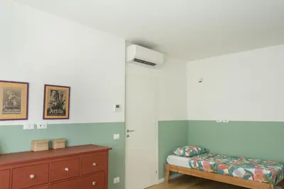 Letto o letti in una camera di Da Coco - Apartments