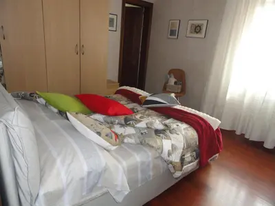 Letto o letti in una camera di HOUSE DOLCEVITA 30 min per Venezia