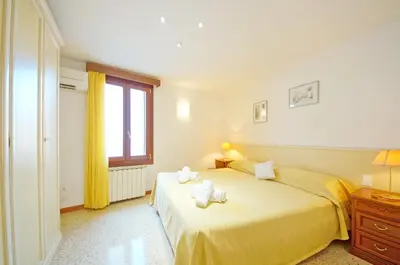 Letto o letti in una camera di DolceVita Apartments N 465 Biennale
