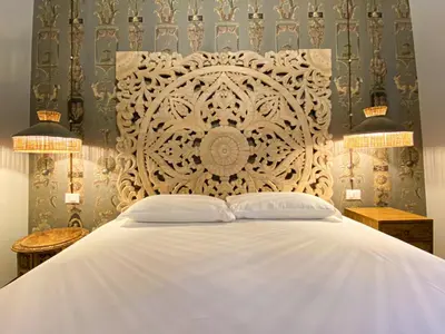 Letto o letti in una camera di Rigoletto Charm