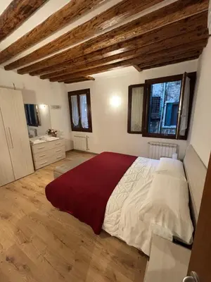 Letto o letti in una camera di Appartamento treVi2