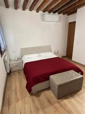 Letto o letti in una camera di Appartamento treVi2