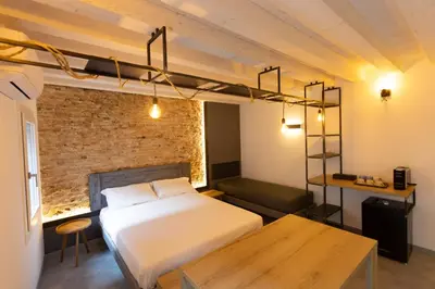 Letto o letti in una camera di Casa San Cristoforo