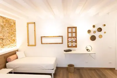 Letto o letti in una camera di Casa San Cristoforo