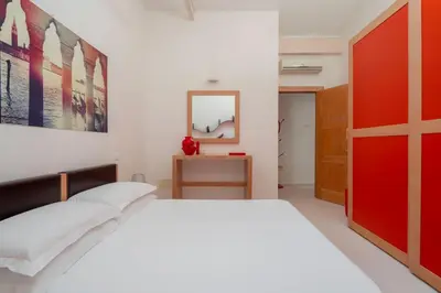 Letto o letti in una camera di The WaterView Alcove