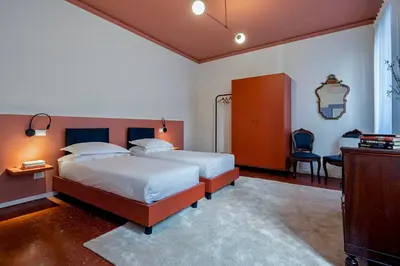 Letto o letti in una camera di The Arsenal Large
