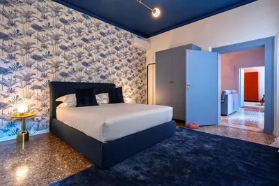 Letto o letti in una camera di The Arsenal Large