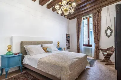 Letto o letti in una camera di Appartamento Cassiano Rialto