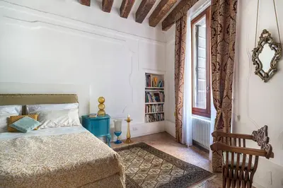 Letto o letti in una camera di Appartamento Cassiano Rialto