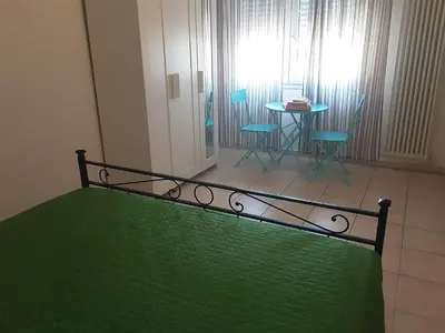 Letto o letti in una camera di Locazione Menini - Appartamento zona stazione