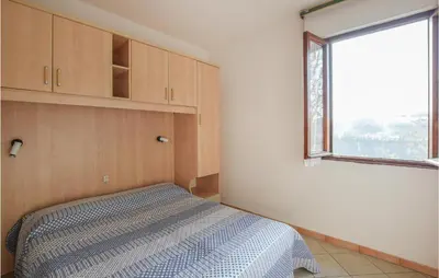 Letto o letti in una camera di Appartamento Eden