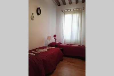 Letto o letti in una camera di CA MARIA IN ST MARK AREA