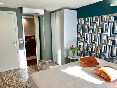 Letto o letti in una camera di 27@Rialto