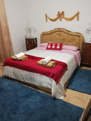 Letto o letti in una camera di B&B Chez Elisabeth