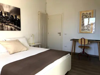 Letto o letti in una camera di Residenza Pedrotti Family