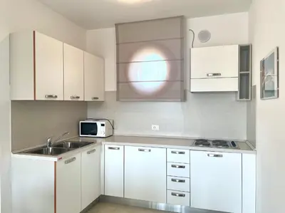 Cucina o angolo cottura di Residence Treporti - Carraro Immobiliare - Family Apartments