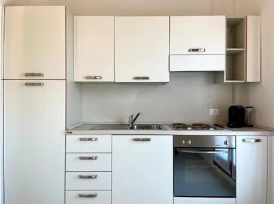 Cucina o angolo cottura di Residence Treporti - Carraro Immobiliare - Family Apartments